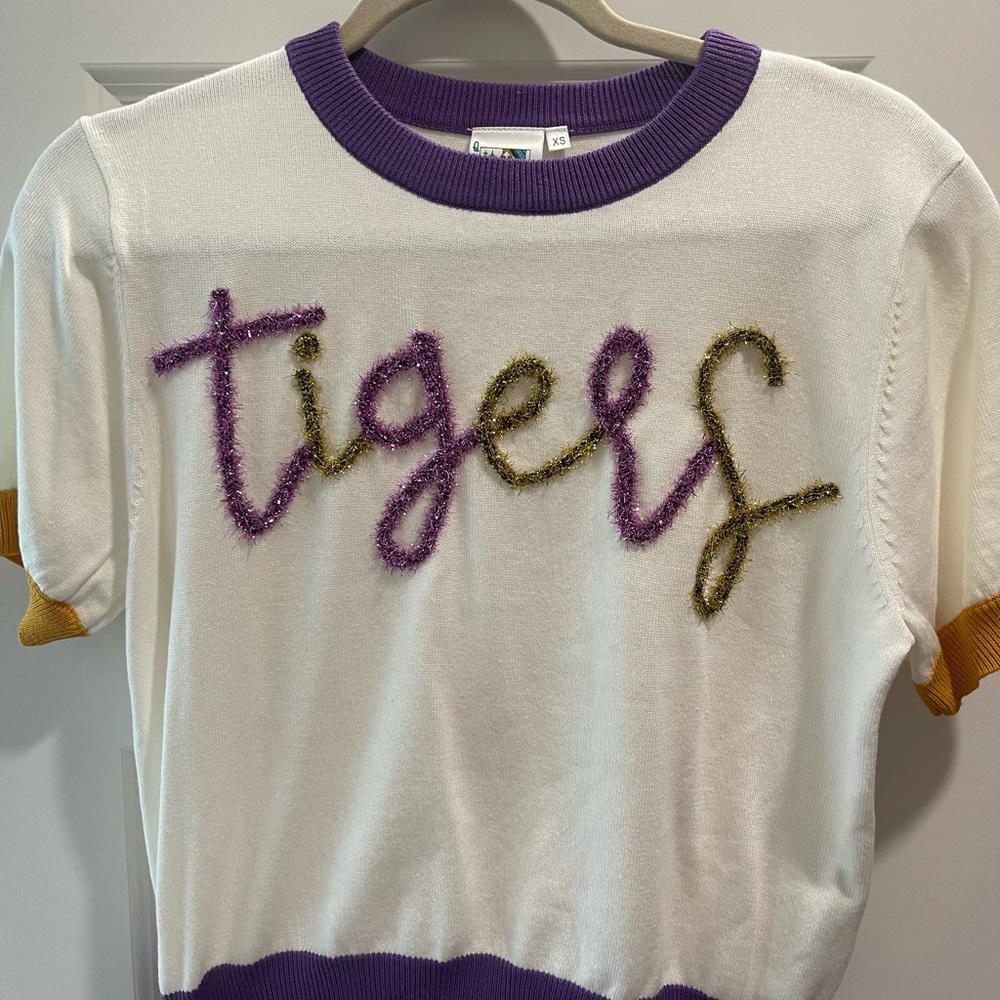 QOS Tigers glitter script s/s. Worn once.